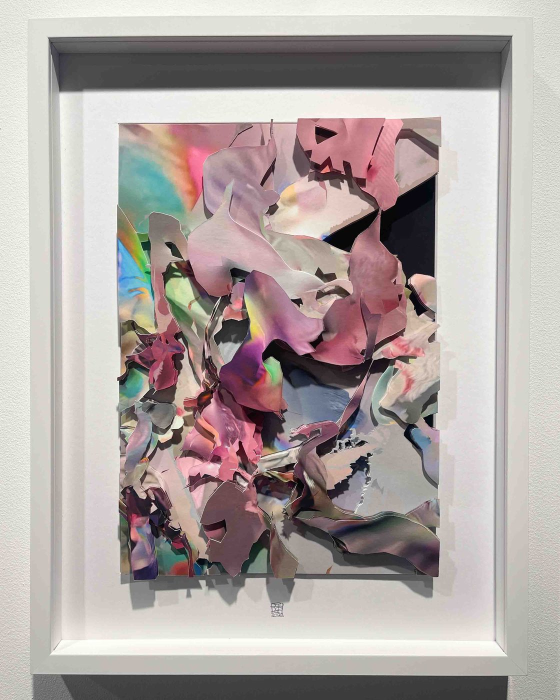 Unseen Worlds – layered paper collage in a white frame, front view