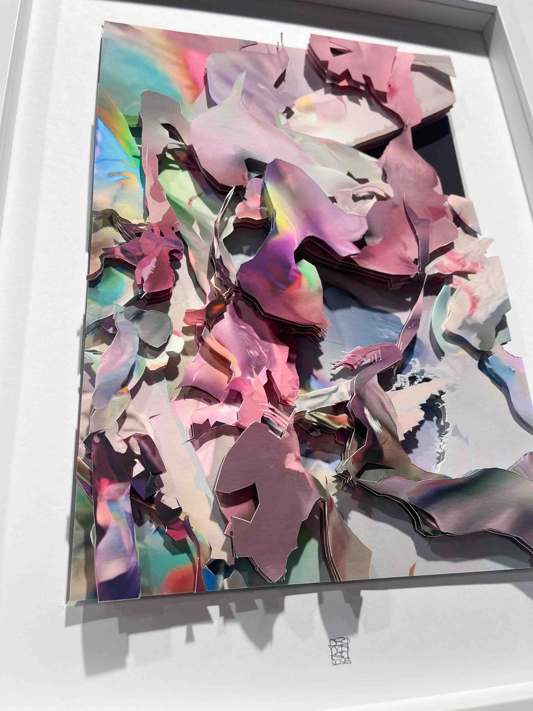 Unseen Worlds – layered paper collage in iridescent colours, seen at an angle