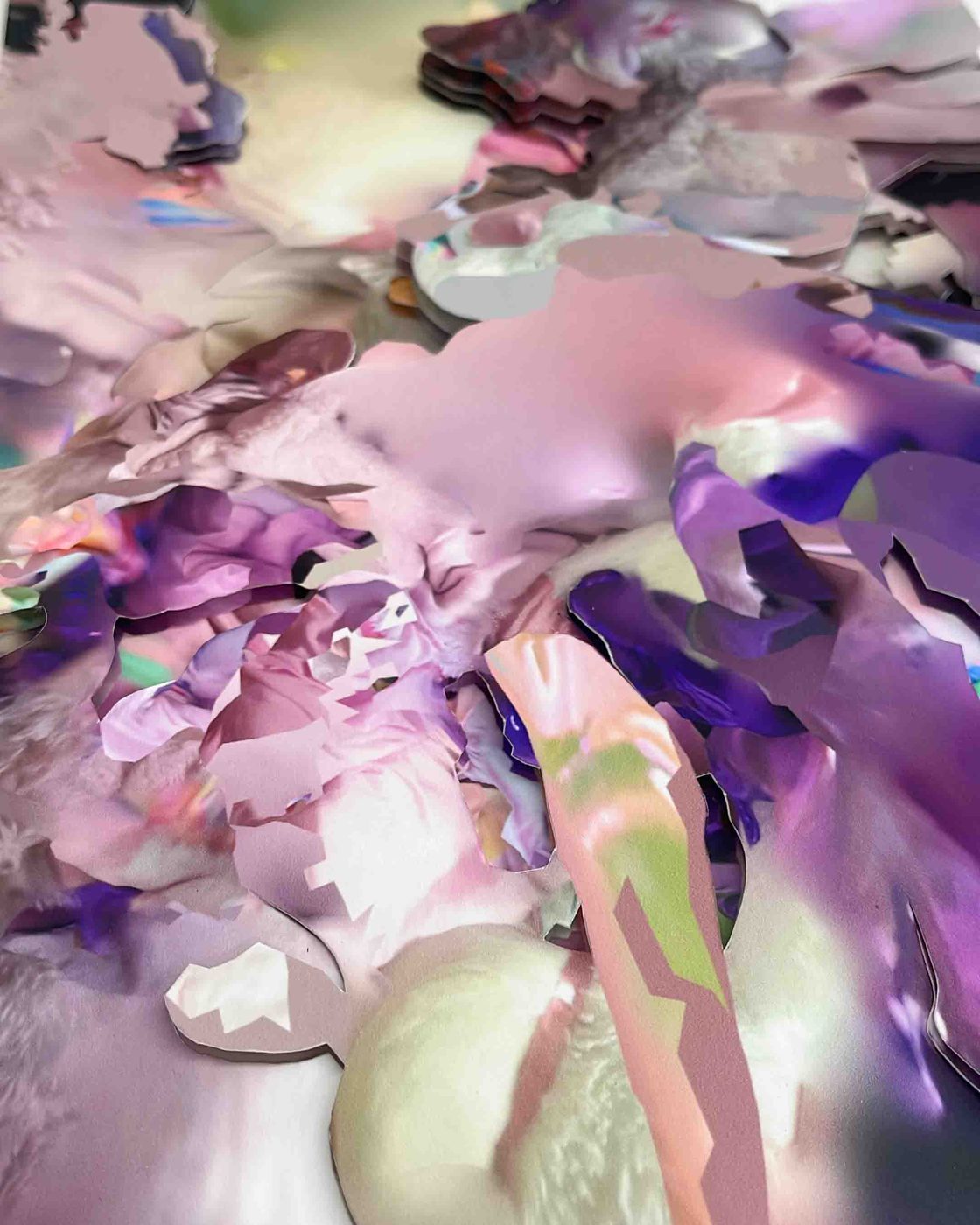 Unseen Worlds – close-up of a layered paper collage in purple and pink tones